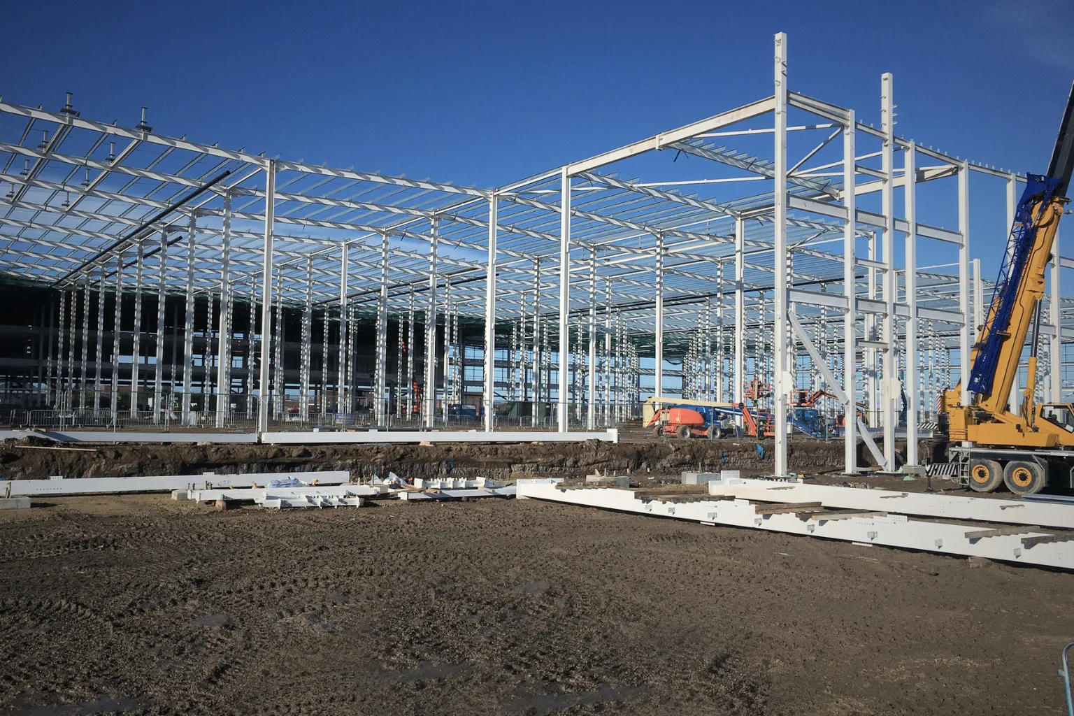 Steel frame structure under construction at a commercial development site